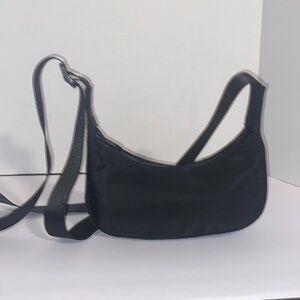 Black purse with adjustable strap